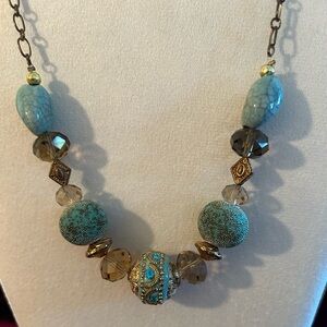Statement necklace in tones of turquoise & old gold